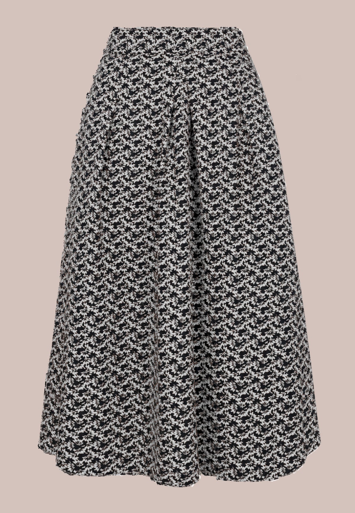 Rock, Modell Elsa mit schwarz-weißem Muster und ausgestellter Silhouette vor roséfarbenem Hintergrund